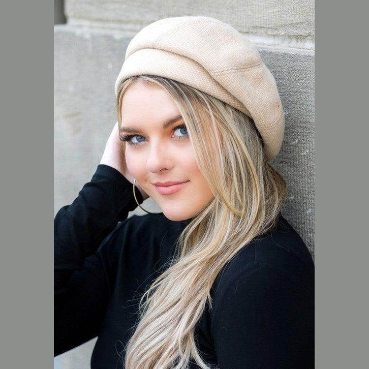 Aili's Corner Fold Over Beret for Travel in neutral color, stylishly worn by a young woman