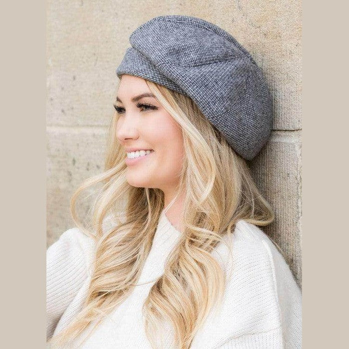 Stylish fold over beret for travel in gray, perfect accessory for chic outdoor looks