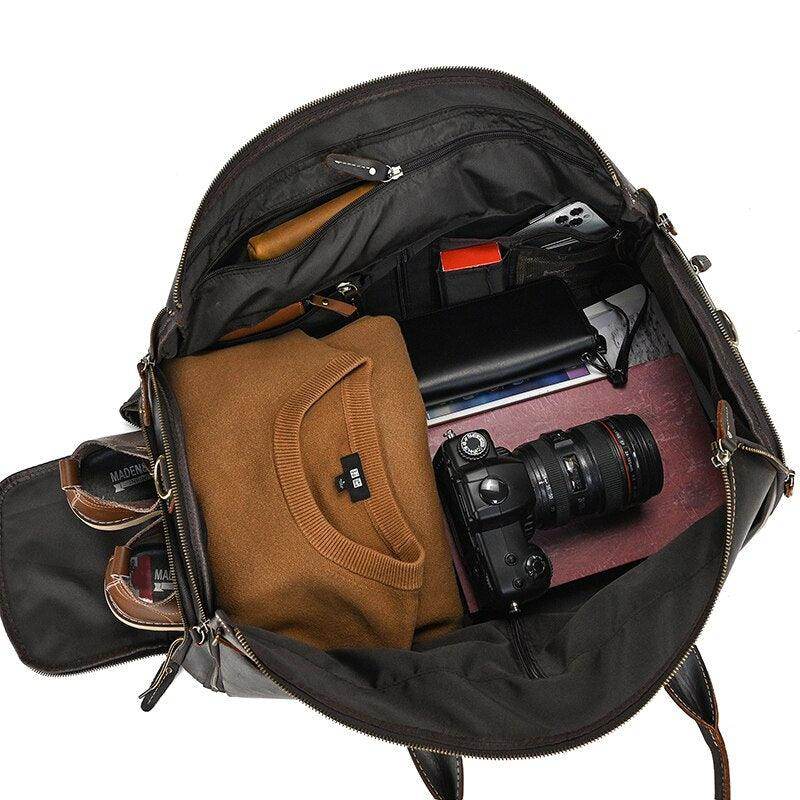 Foldable leather suit bag by VacationGrabs featuring spacious interior for clothing and accessories