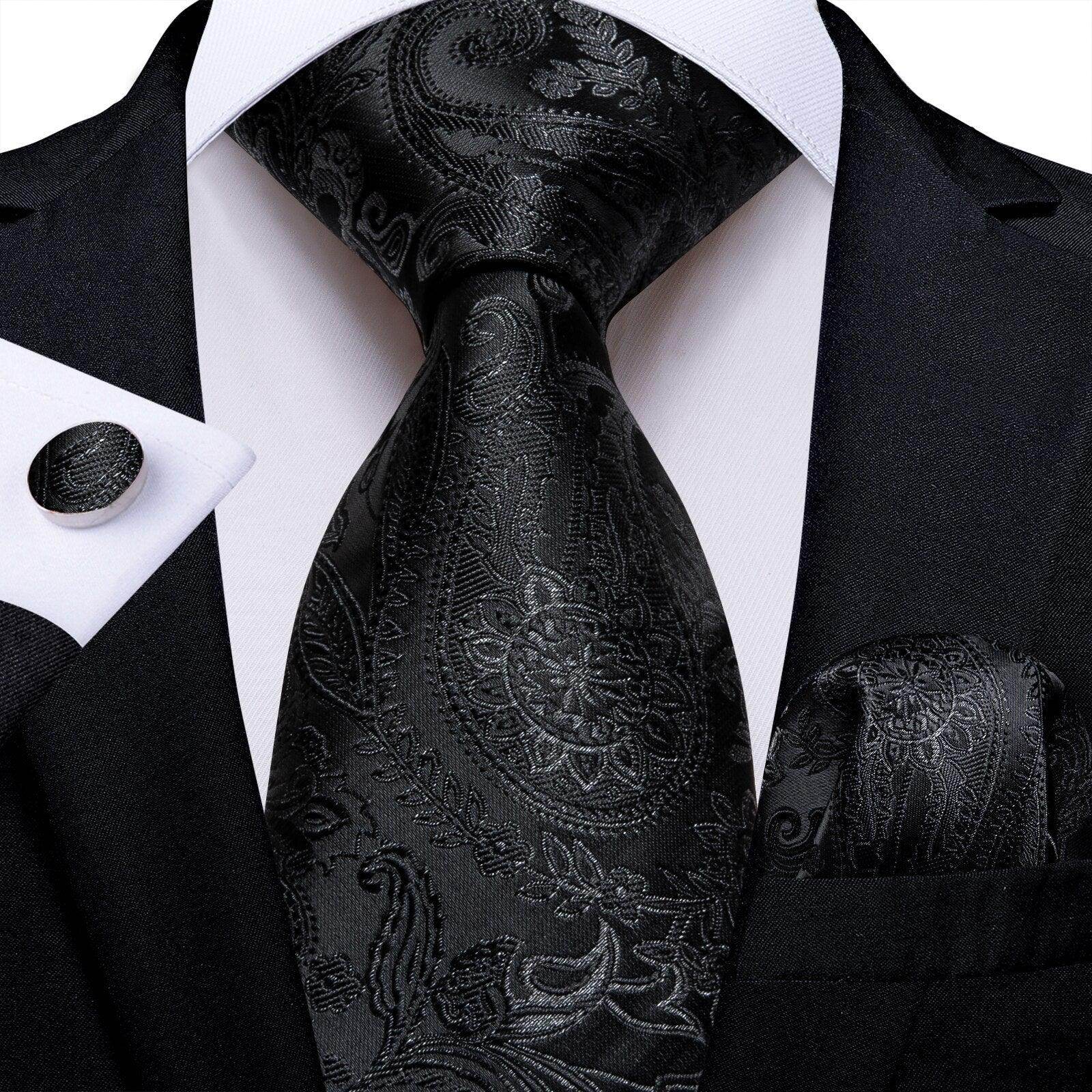 Black paisley formal neck tie for men with matching pocket square and cufflinks for elegant occasions