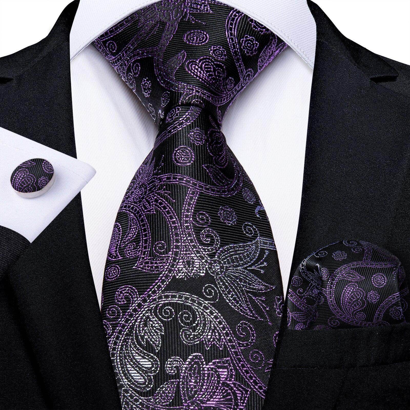 Elegant purple formal neck tie for men with intricate paisley design and matching pocket square