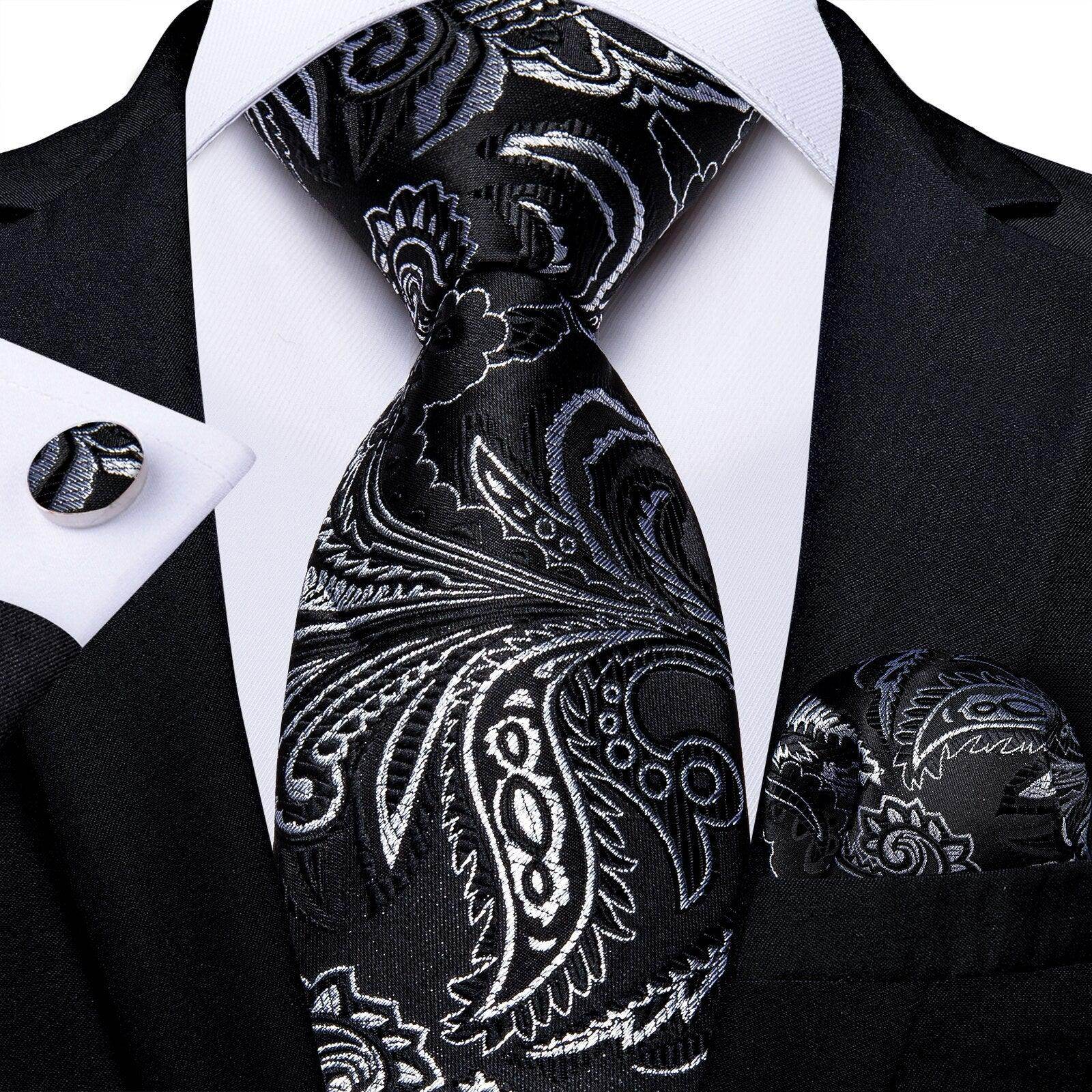 Elegant black paisley formal neck tie for men with matching pocket square and cufflinks