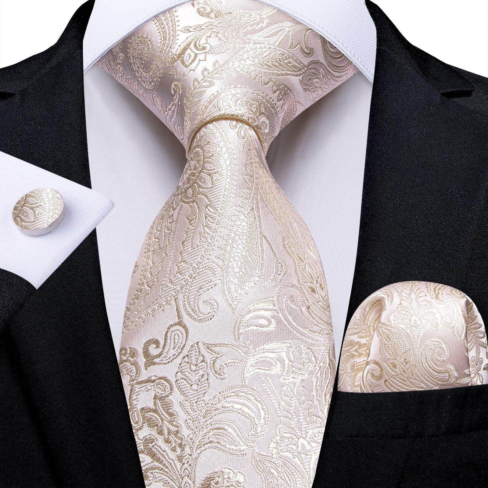 Elegant beige formal neck tie for men featuring intricate paisley patterns and coordinated pocket square