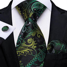 Luxury green and gold paisley formal neck tie for men with matching pocket square and cufflinks