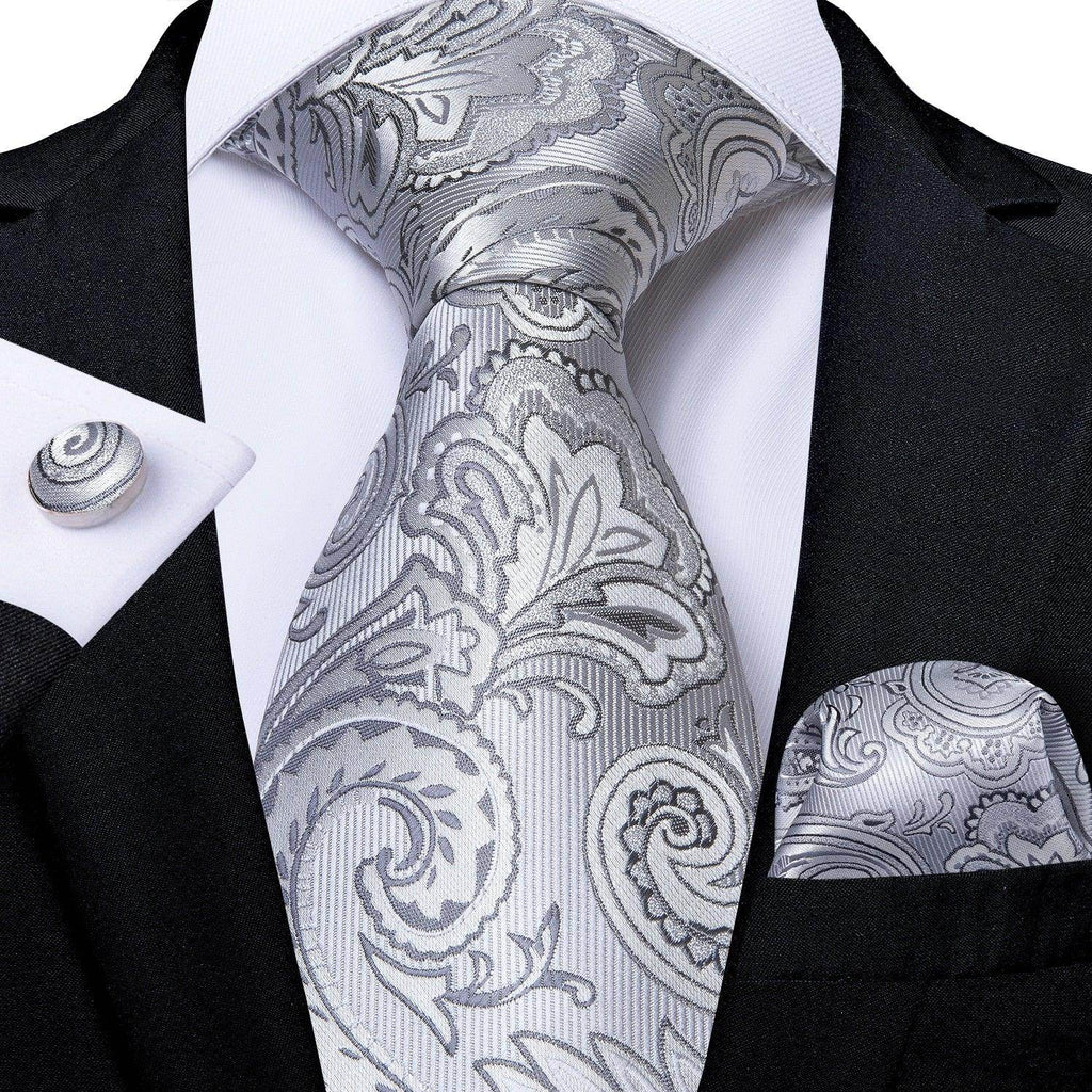 Elegant silver paisley formal neck tie for men with matching pocket square and cufflinks