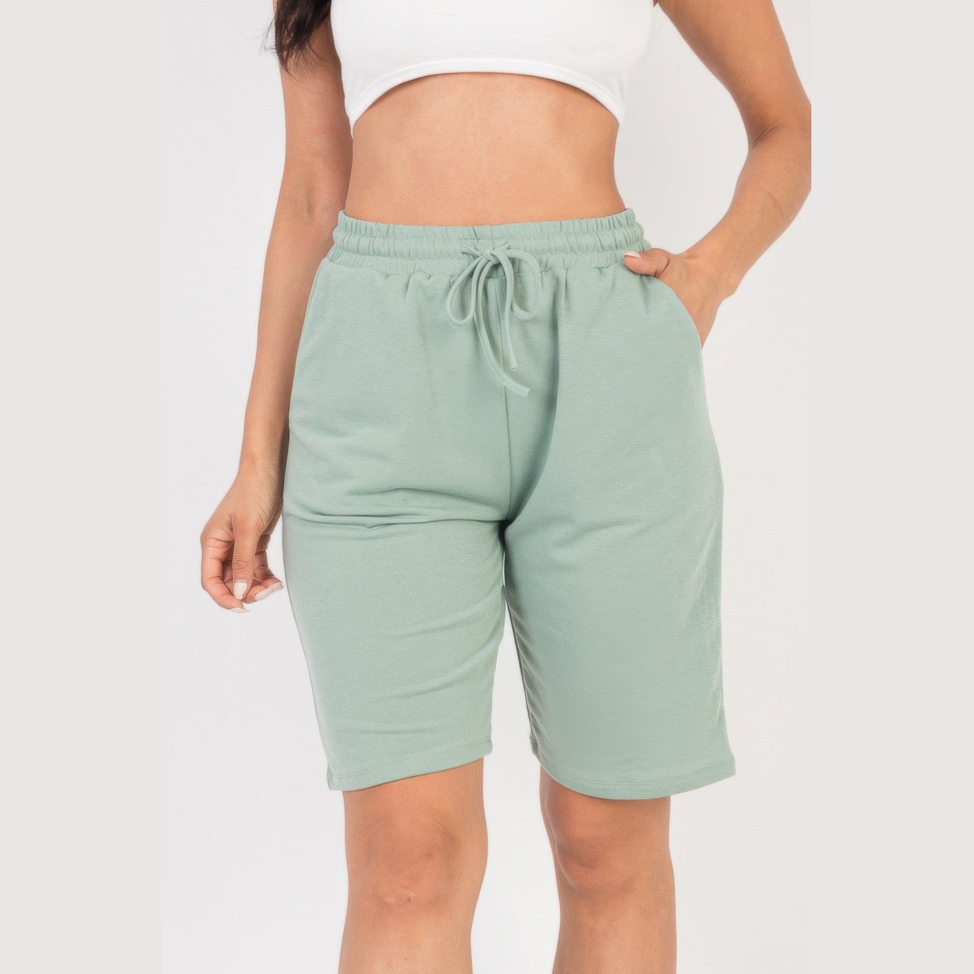 VacationGrabs women's french terry bermuda shorts in light green with elastic waistband and drawstring