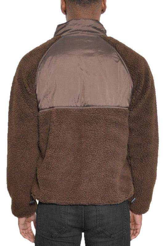 Back view of WEIV full zip sherpa jacket in brown, featuring a soft fleece texture and a stylish design