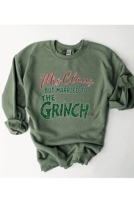 Funny Christmas sweaters featuring Mrs Claus but married to the Grinch in green color