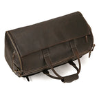 Brown leather garment bag for travel with sturdy handles