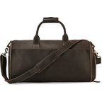 Brown leather garment bag for stylish travel convenience