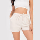 VacationGrabs beige french terry shorts for women with drawstring waist and side pockets