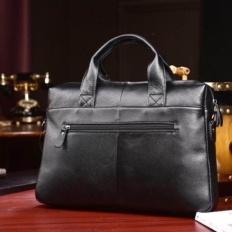 Genuine leather briefcase with slim design and secure zip pocket for stylish professionals