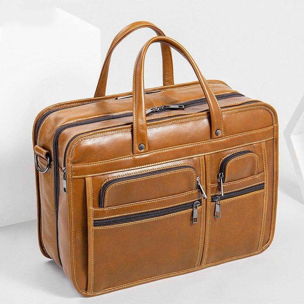 VacationGrabs genuine leather business briefcase with multiple pockets and sturdy handles