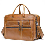 VacuumGrabs genuine leather business briefcase with multiple zippered pockets and carrying handles