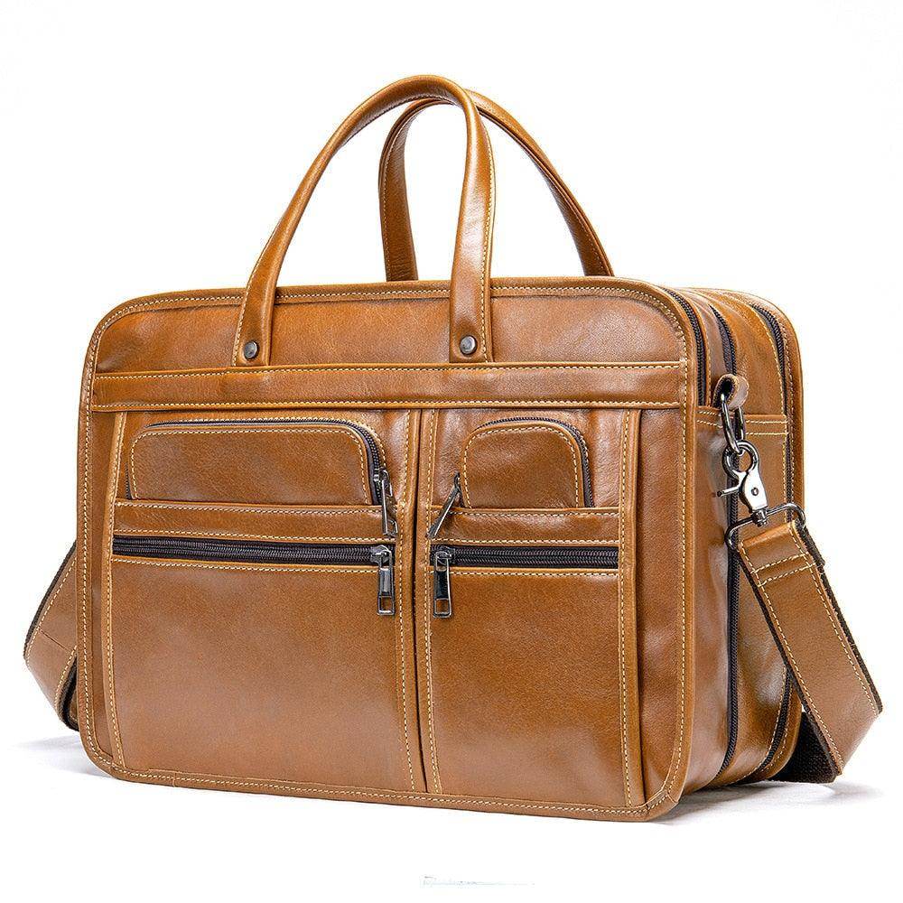 Genuine leather business briefcase in tan with multiple zippered pockets for organized storage