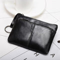 Genuine leather coin wallet in black with a sleek design and convenient zipper closure