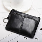 Genuine leather coin wallet in black with a sleek design and convenient zipper closure