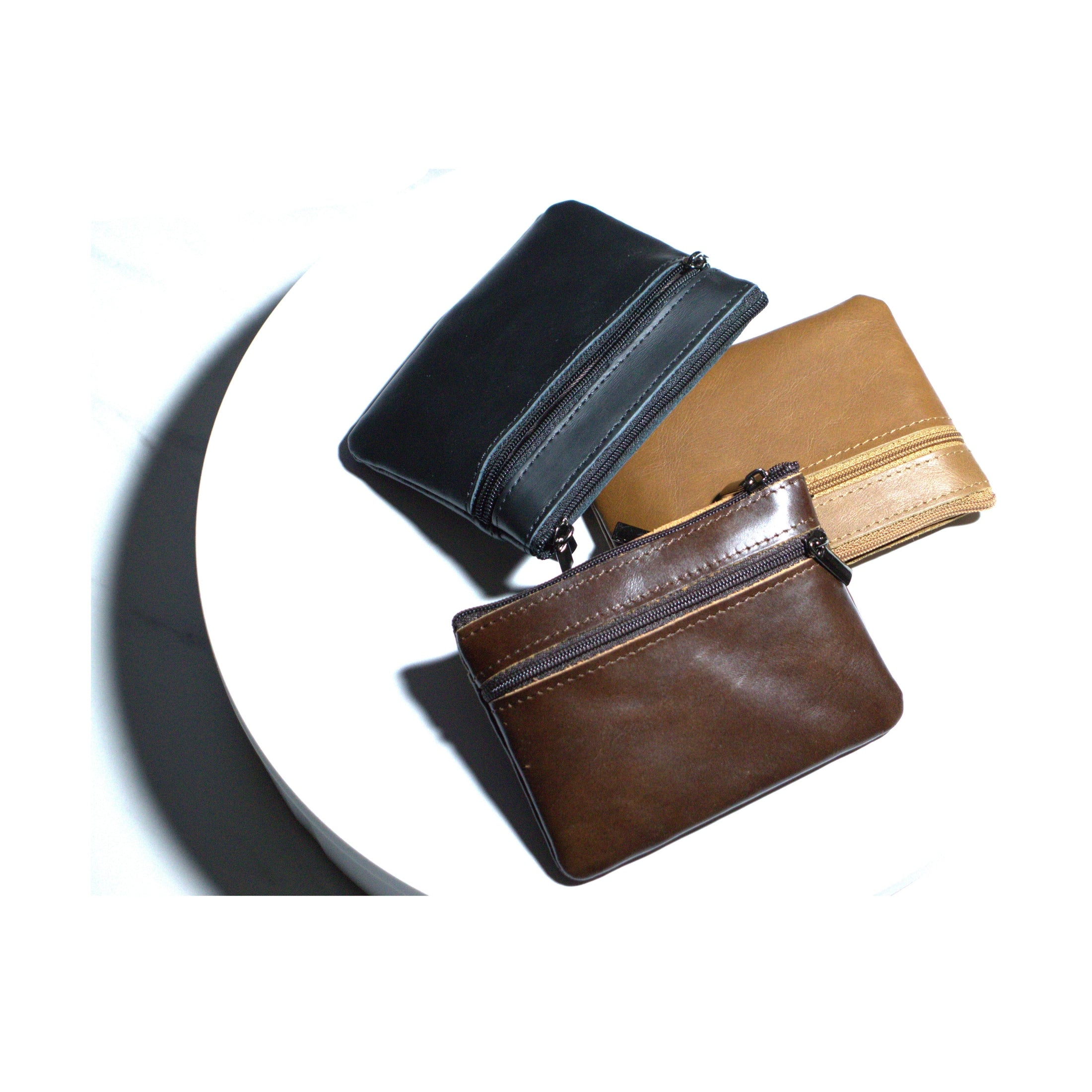 Assorted genuine leather coin wallet in black, brown, and tan colors for everyday use