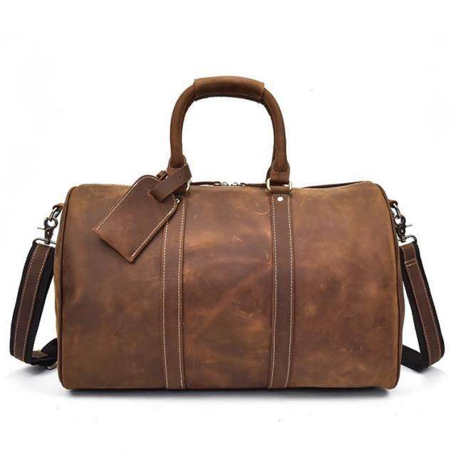 VacationGrabs genuine leather duffel bags in brown with sturdy handles and adjustable shoulder strap