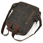 Genuine leather laptop backpack in dark brown with adjustable straps and exterior zipper pocket