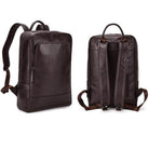 Genuine leather laptop backpack featuring a sleek design and padded straps for comfort