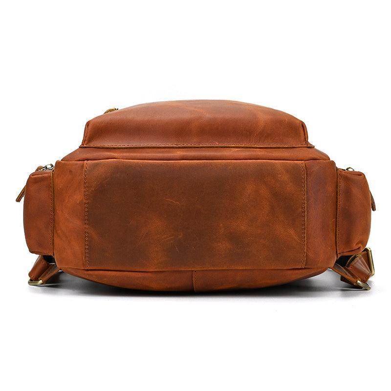 Genuine leather laptop backpack with sleek design and spacious storage for work and travel
