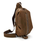 Genuine leather mens chest bag in brown with adjustable strap and zippered pockets for stylish convenience