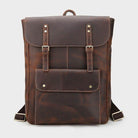Genuine leather mens travel backpack with adjustable straps and front pocket for convenient storage