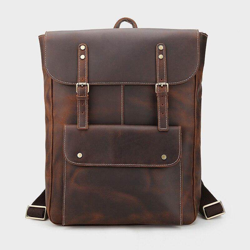 Genuine leather mens travel backpack with adjustable straps and front pocket for convenient storage