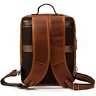 Genuine leather travel backpack with padded straps for comfortable carrying and durable design