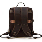 Genuine leather travel backpack in dark brown with padded back and adjustable shoulder straps