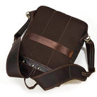 Genuine leather travel backpack in brown with adjustable shoulder strap and durable design