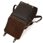 Genuine leather travel backpack in brown with sleek design and spacious interior for travelers