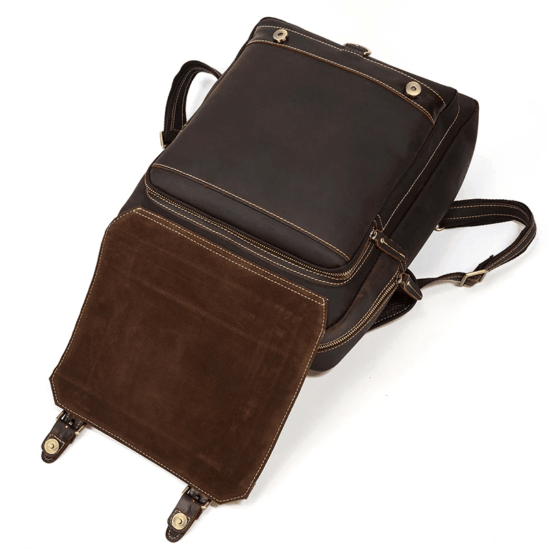 Genuine leather travel backpack in brown with sleek design and spacious interior for travelers