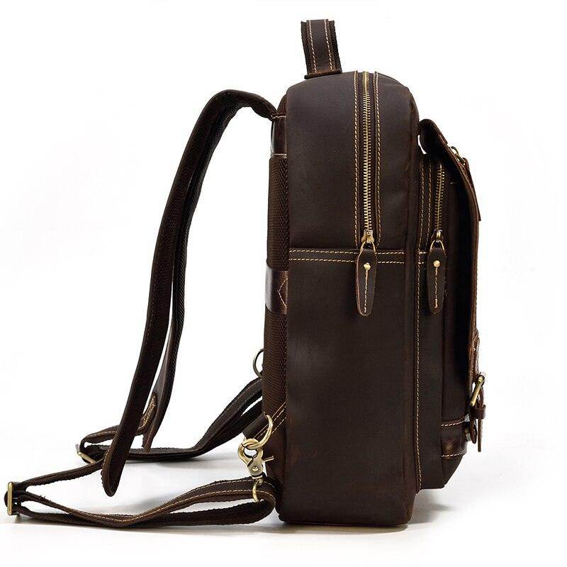 Genuine leather travel backpack in brown with multiple compartments and sturdy straps for comfortable carrying