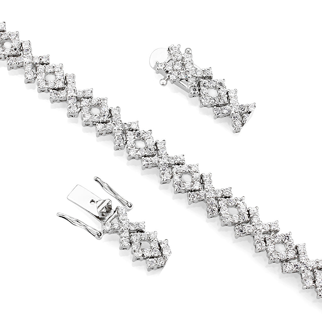 Elegant silver bracelet and earring set featuring shimmering stones, perfect as gift jewelry