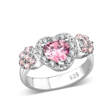 Heart-shaped pink gemstone ring with sparkling accents, perfect gift jewelry for special occasions