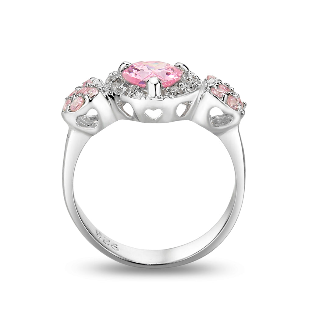 Elegant silver ring featuring a pink center stone and decorative accents, perfect for gift jewelry.