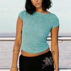 Women's glitter crop top in turquoise, perfect for summer outings