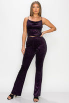 Glitter flare pants women clubwear in dark purple velvet worn with matching crop top