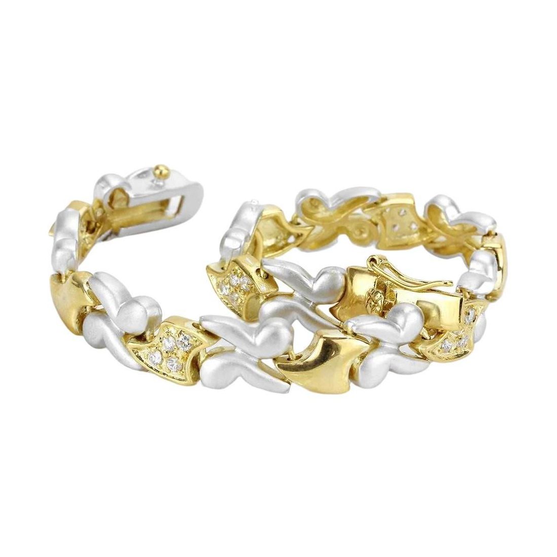 Elegant gold and rhodium women's bracelet featuring shimmering accents and a unique design