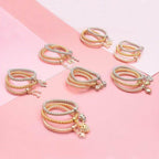 Stylish gold and silver bracelet set featuring multiple layered designs for elegant looks