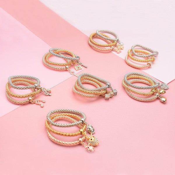Stylish gold and silver bracelet set featuring multiple layered designs for elegant looks
