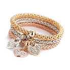 ClaudiaG Collection gold and silver stackable bracelets with sparkling heart charms