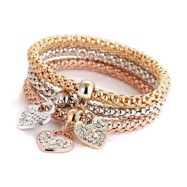 ClaudiaG Collection gold and silver stackable bracelets with sparkling heart charms