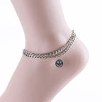 Bella Chic gold anklet with smiley charm featuring a double chain design on ankle