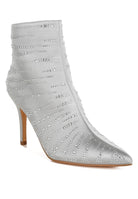 Stylish gold embellished ankle boots with a sleek design and high heels for fashionable outfits
