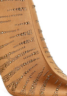 Stylish gold embellished ankle boots with intricate bead detailing for a fashionable look