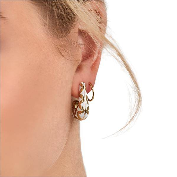 ClaudiaG Collection gold floral hoop earrings with intricate flower designs, perfect for stylish women