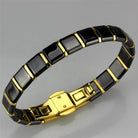 Stylish gold ion plated women's bracelet with black and gray ceramic links for everyday wear